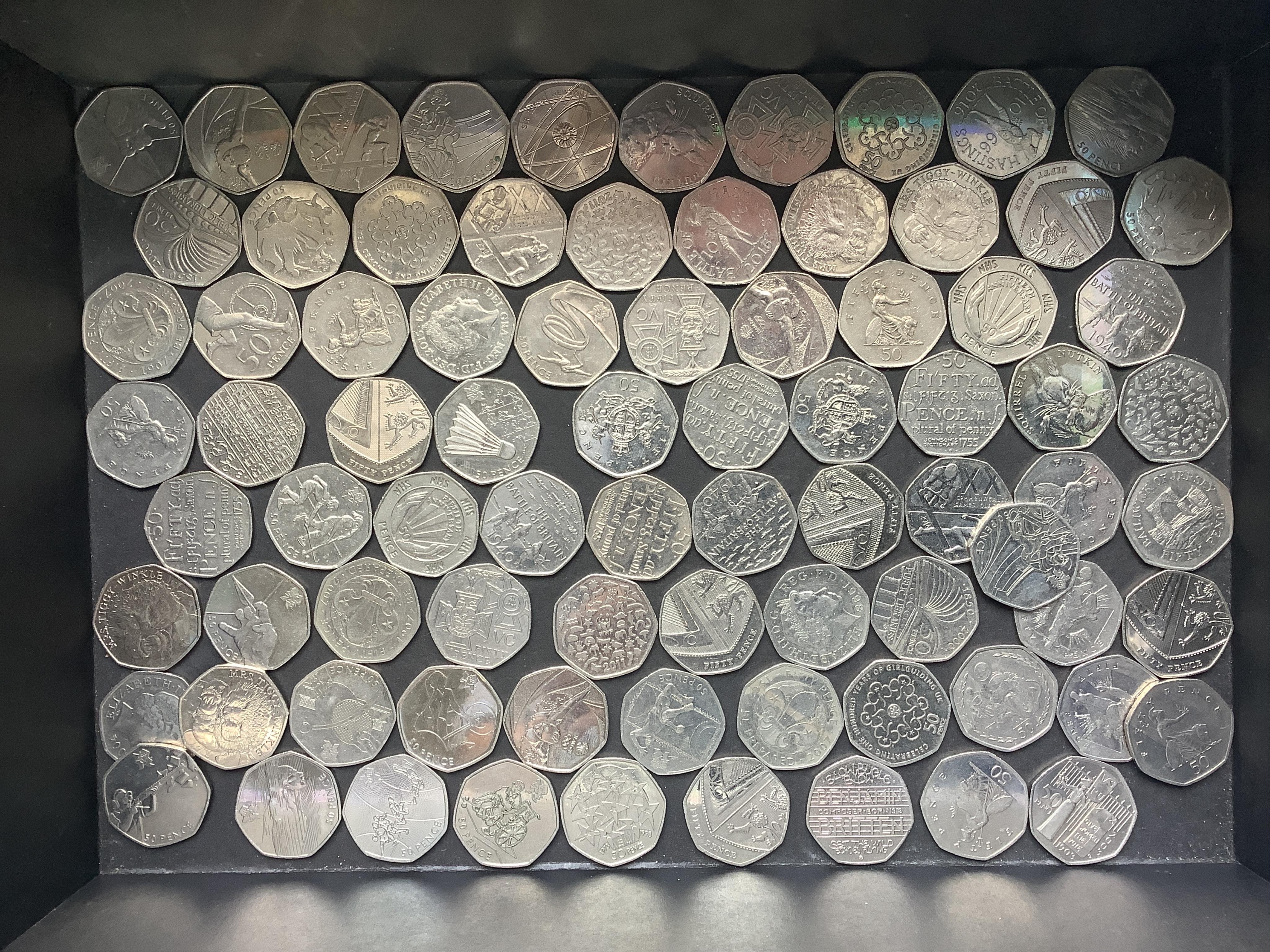 British and USA coins, including various silver dollars and presentation sets and a large number of QEII 50p coins many with 2011/12 Olympic designs, etc.